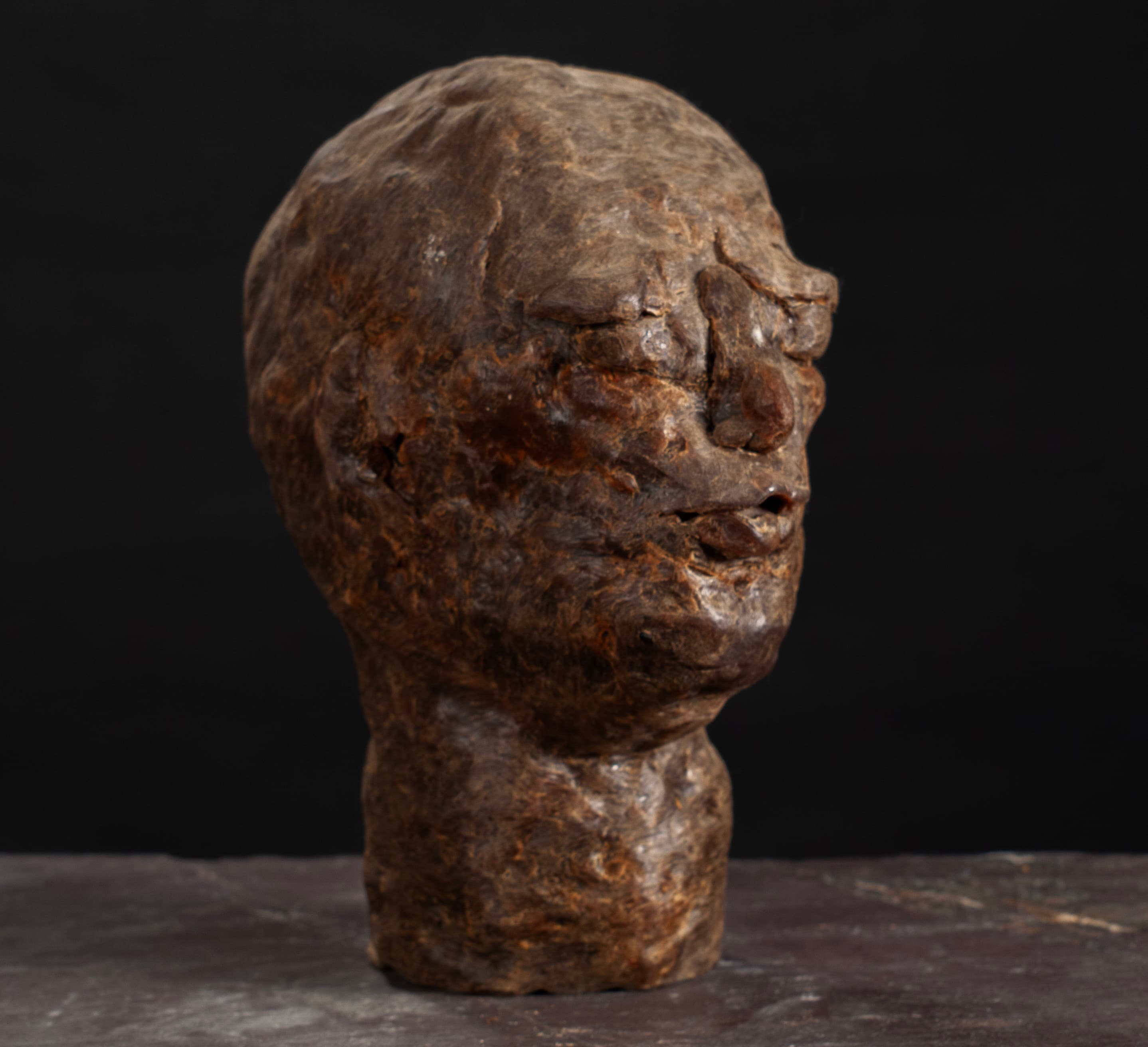 Art with the title "Hideous Face Wax".