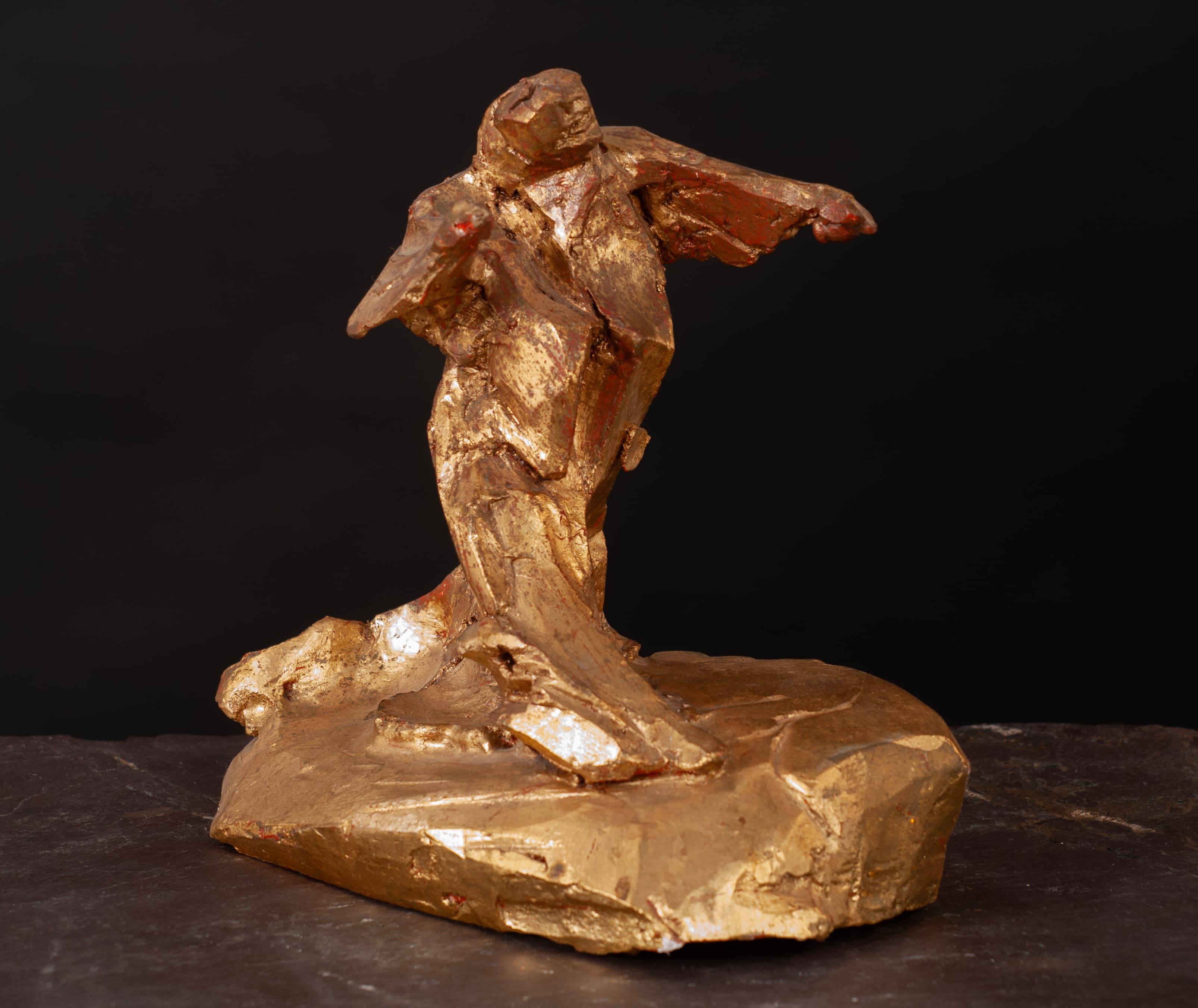 Art with the title "Striding Man".